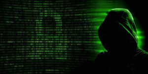 Image depicting a person wearing a black hooded sweatshirt, surrounded by green binary code. The concept symbolizes blackhat SEO tactics.