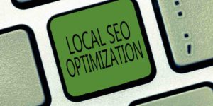 Key with the words 'Local SEO Optimization' inscribed on it.